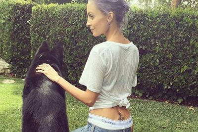The Richie-Madden family's pooch Iro is always by Nicole's side.