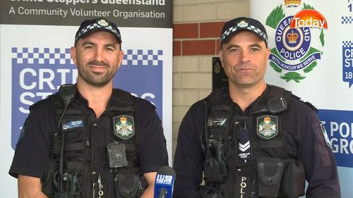 Const Jeremy Gardiol (left) and Sen-Const Kevin Mayo were called to a traffic accident and found the driver trapped. Picture: 9NEWS