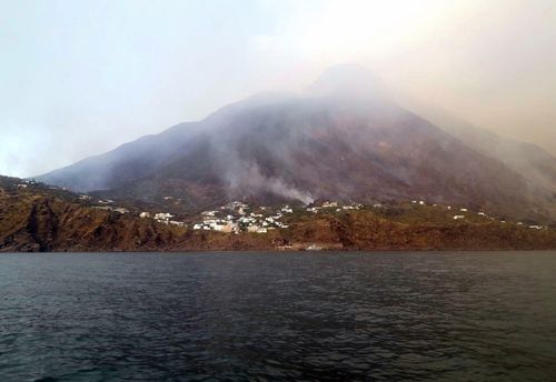 The news agency ANSA says that some 30 tourists jumped into the sea out of fear after a series of volcano erupted on the Sicilian island of Stromboli. 