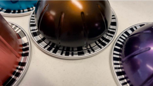 Each Vertuo coffee pod has a barcode under the rim, this tech tells the machine exactly how much water to use.