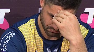 An emotional Jesse Bromwich reacts to words from Craig Bellamy in the Storm press conference following their finals loss to Canberra.