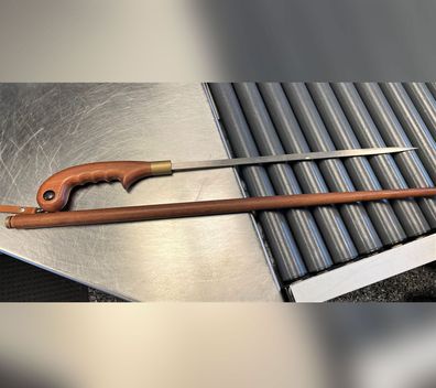 sword found in cane - cnn