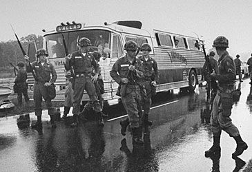 Martial law was declared in which town in 1961 as rioters attacked Freedom Riders?