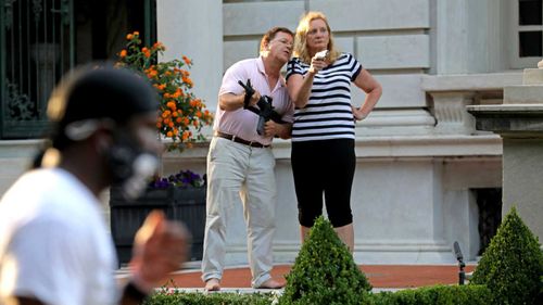 Mark and Patricia McCloskey pointed their guns at protesters walking past their St Louis mansion.