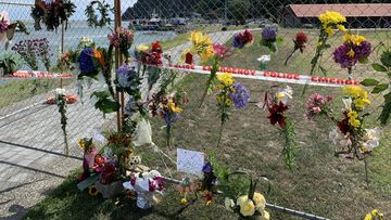 Tributes for the victims in Whakatane.