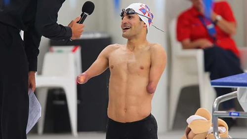 Ahmed Kelly after breaking the men's 100m breaststroke SB3 record.