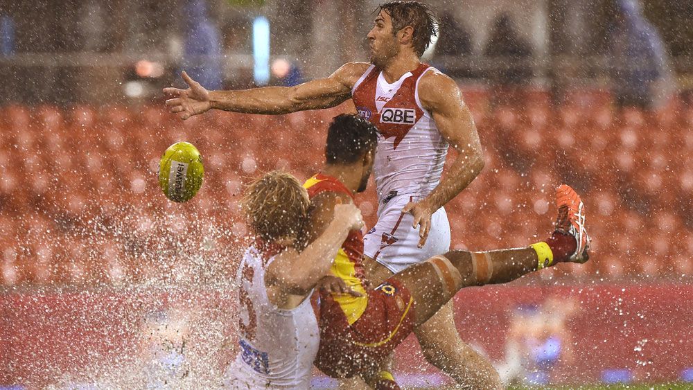 Swans down Suns on soggy Gold Coast