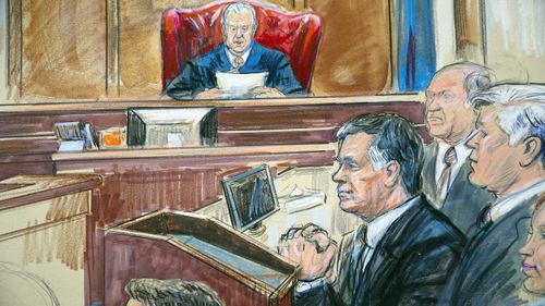 A courtroom sketch of Paul Manafort (centre).