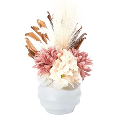 Artificial flowers in wave vase: $17.00