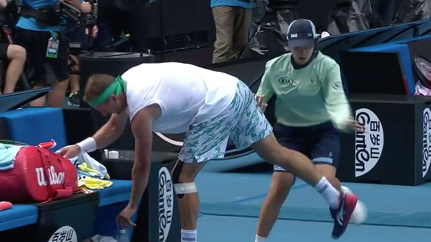 Ballkid collides with Tennys Sandgren at Australian Open match with Roger Federer