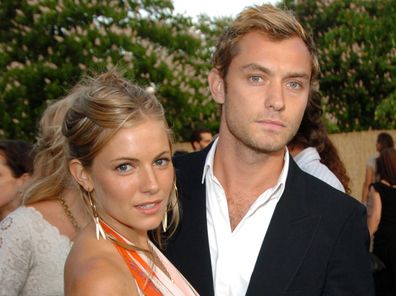 Sienna Miller and Jude Law in London in June 2004.