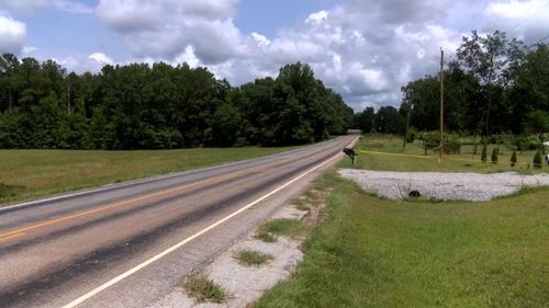 A kidnapped girl's escape in Alabama has led to the discovery of two decomposing bodies and the arrest of a man now facing murder and kidnapping charges, authorities said.