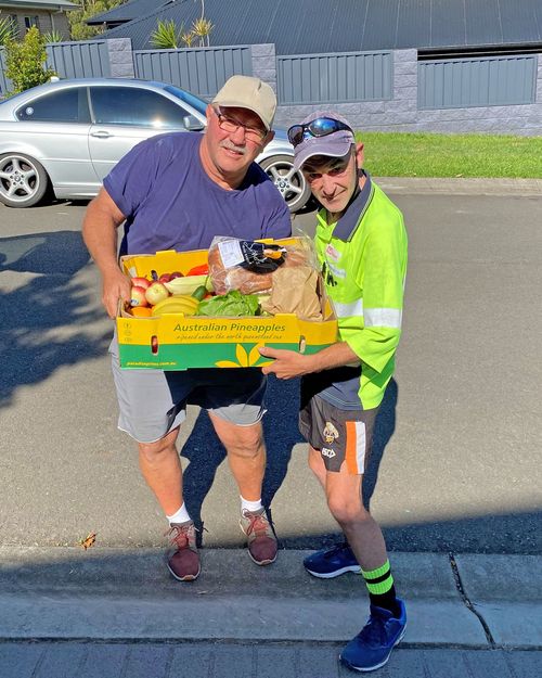 Locals have all rushed to help Mark after hearing of his cancer diagnosis. He is pictured here receiving a fruit and vegetable box from Box Divvy Calderwood Honeybee.