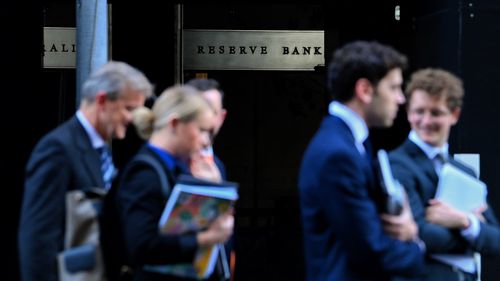 People walk past the Reserve Bank of Australia in Martin Place, Sydney.