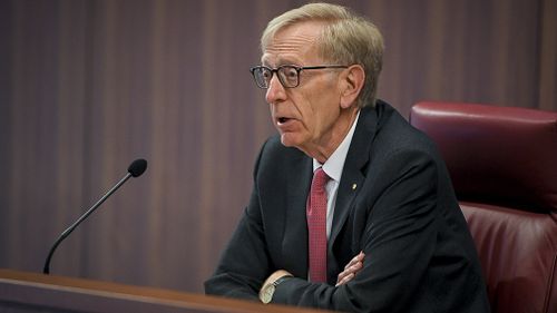 Former High Court judge and banking Royal Commissioner Kenneth Kayne QC put the institutions on warning today in the first hearing of the inquiry (AAP).