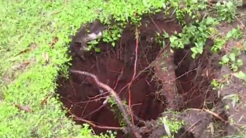The cause of the sinkhole remains unknown. (9NEWS)