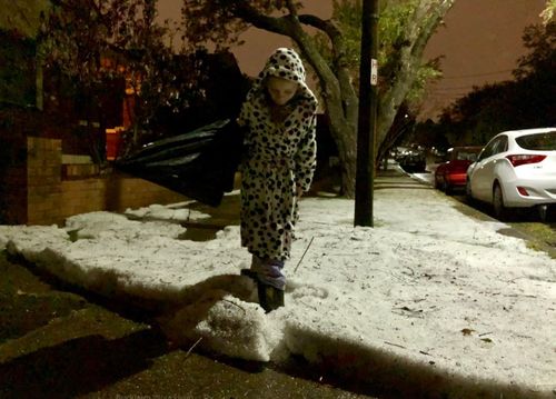 Thunderstorms have brought snow like hail to Sydney.