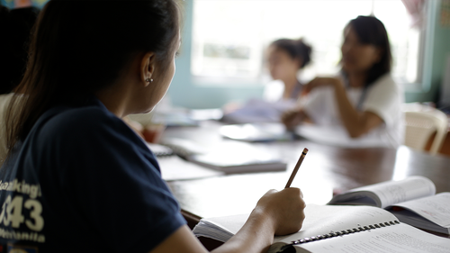 In this April 25, 2017, photo, former cybersex victims participate in a study course at a counseling center for sexual exploitation survivors in Manila, Philippines.