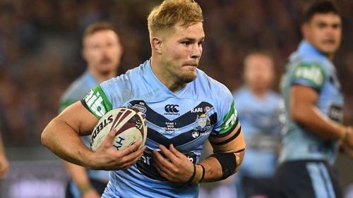 The Origin player has been charged with aggravated sexual assault in company.