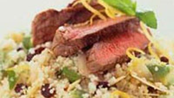 Warm lamb salad on avocado mint couscous