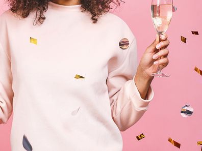 Woman holding birthday balloon