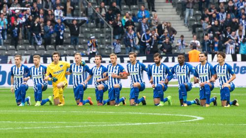 "Hertha Berlin stands for tolerance", the club tweeted after players took a knee. (AP)