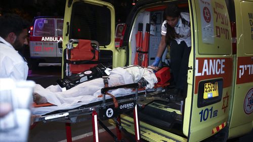 A person wounded in an attack is brought to a hospital in Tel Aviv, Israel.