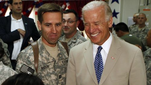Joe Biden talks with soldiers with his late son and US Army Captain Beau Biden in 2009.