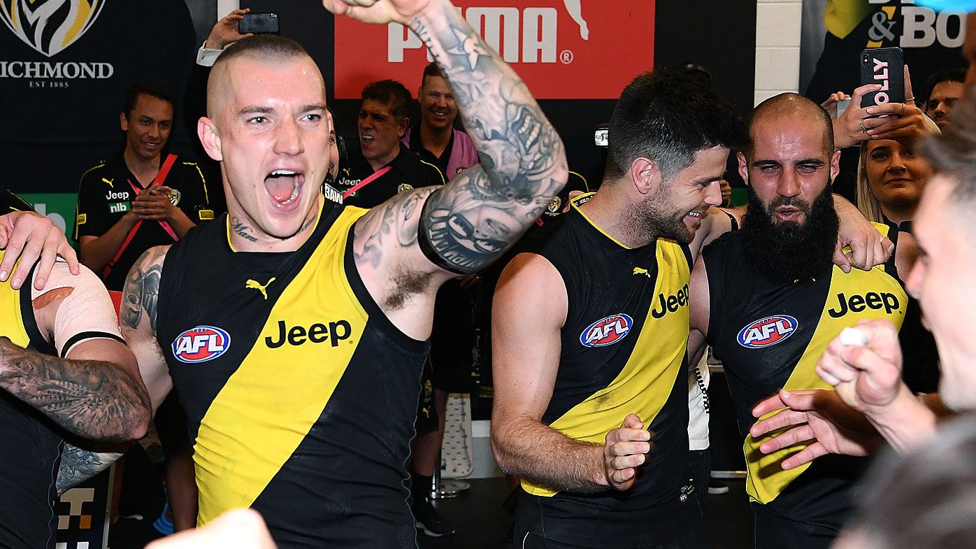 Dustin Martin of the Tigers celebrates winning the AFL Preliminary Final 