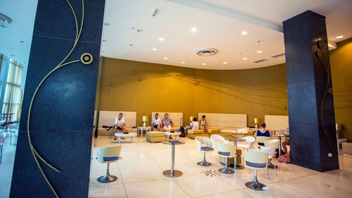 A customer sits at the lobby bar of the Hotel Capri in Havana, Cuba. (AP)