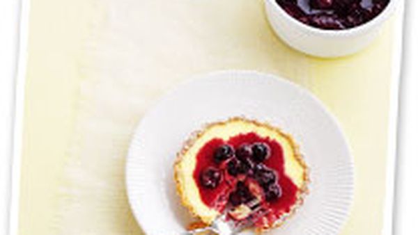 Lime tartlets with blueberry sauce