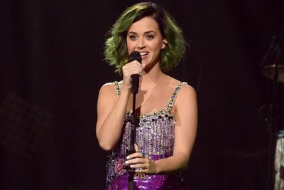 The 29-year-old singer managed to charm the voters, even with her self-described "slime green" hair!