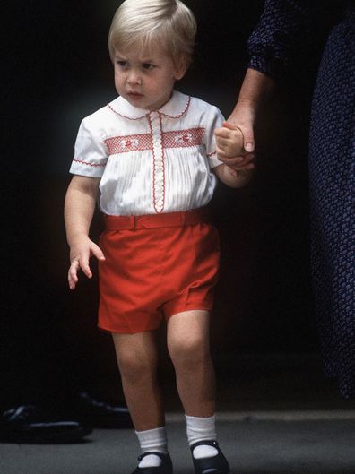 Prince William leaves St Mary's Hospital after visiting his newborn brother, Prince Harry, on September 16, 1984 in London, England.