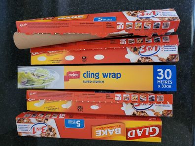 Empty baking paper and cling wrap boxes decluttered from kitchen drawers