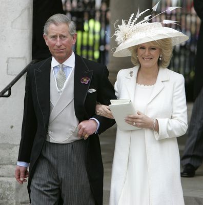 TRH Prince Charles, the Prince of Wales, and his wife Camilla, the Duchess of Cornwall, depart the Civil Ceremony where they were legally married, at The Guildhall, Windsor on April 9, 2005 in Berkshire, England.