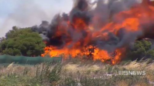 The fire is believed to be moving at 2km/hr aided by strong winds. (9NEWS)