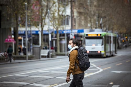 A man wears a face mask due to the Covid-19 pandemic in Melbourne's CBD.