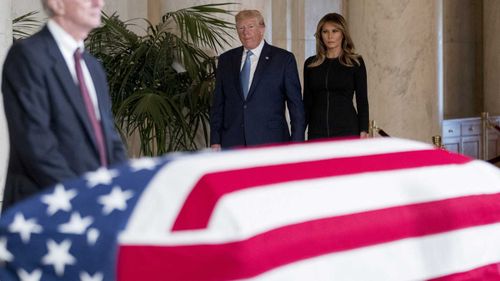 Donald Trump was on his way to pay his respects to a late Supreme Court judge when he lashed out at 'the squad'.