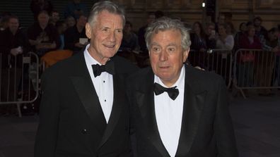 Michael Palin (L) and Terry Jones arrive for the 25th British Academy Cymru Awards at St David's Hall on October 2, 2016 in Cardiff, Wales.