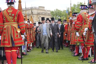 Britain's King Charles III attends a garden party at Buckingham Palace, London, Wednesday May 7, 2025.  (Yui Mok/Pool Photo via AP)