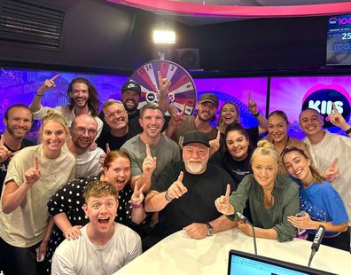 Kyle Sandilands and Jackie 'O' Henderson and their team