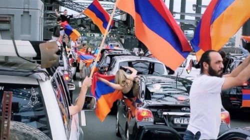 Protesters waved Armenian flags on the bridge.