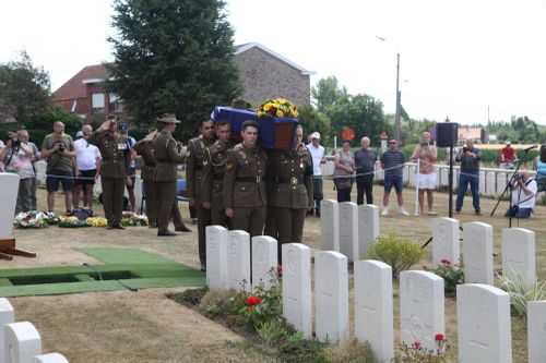 Pallbearer party, formed of Australian Army's Jonathan Church Award recipients, carry the casket of an unknown Australian WW1 soldier at Tyne Cot Cemetery in Zonnebeke, Belgium.  