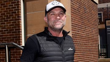 Former cricketer Michael Slater leaves Manly Police Station on October 20, 2021.