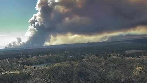 Time-lapse video captures 'fire-whirl' as blazes burn thousands of ...