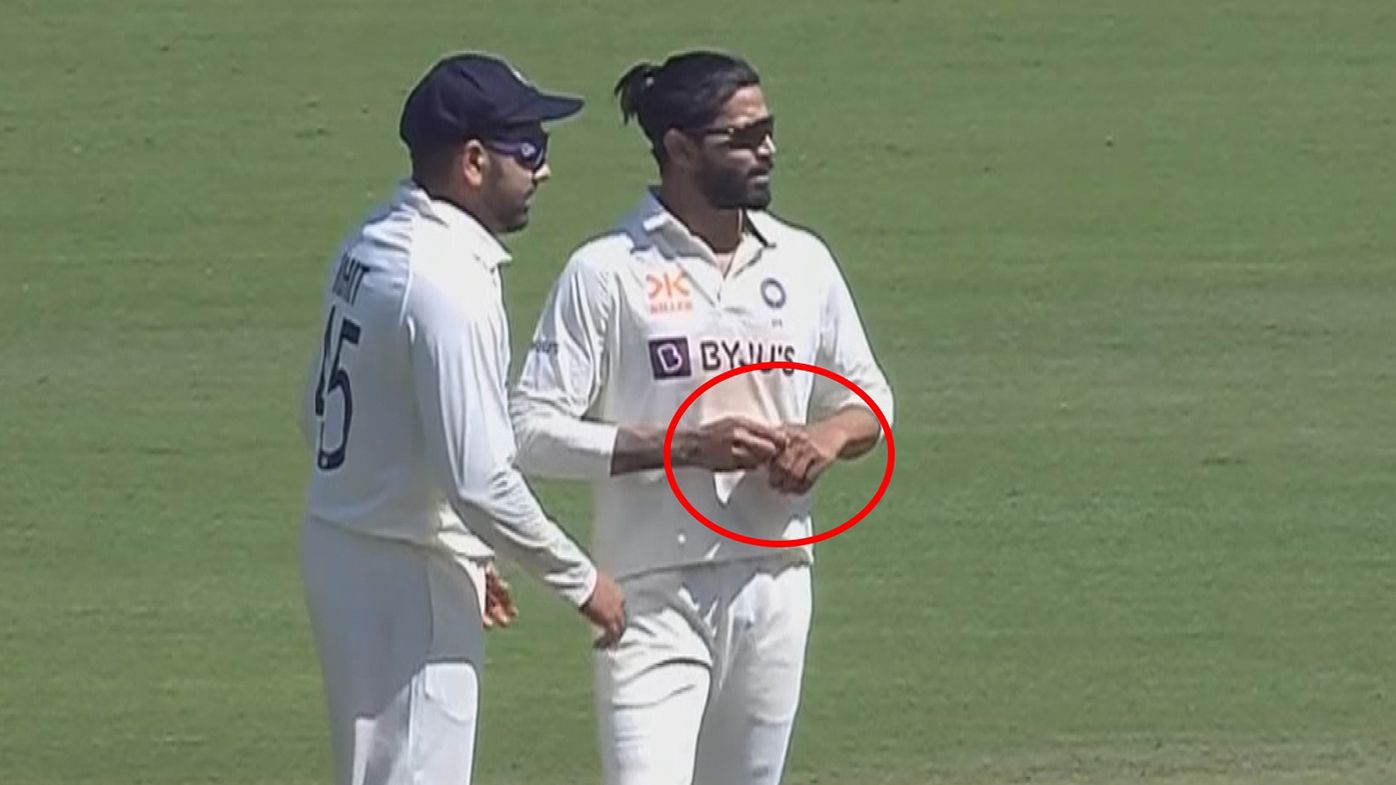 Indian bowler Ravindra Jadeja appears to rub a substance onto his spinning finger.