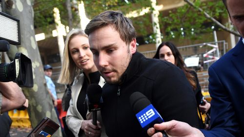 Adam Cranston (centre) leaves the Sydney Police Centre in Surry Hills, Sydney, on May 18, 2017. (AAP)