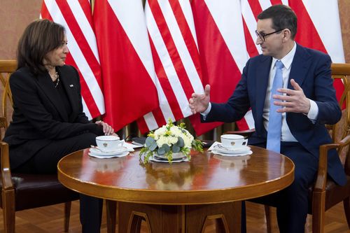 Poland's Prime Minister Mateusz Morawiecki, right, speaks with US Vice President Kamala Harris during a meeting, in Warsaw, Poland, Thursday, March 10, 2022 