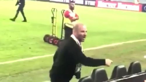 Calombaris was filmed losing it on a fan at the grand final game. 