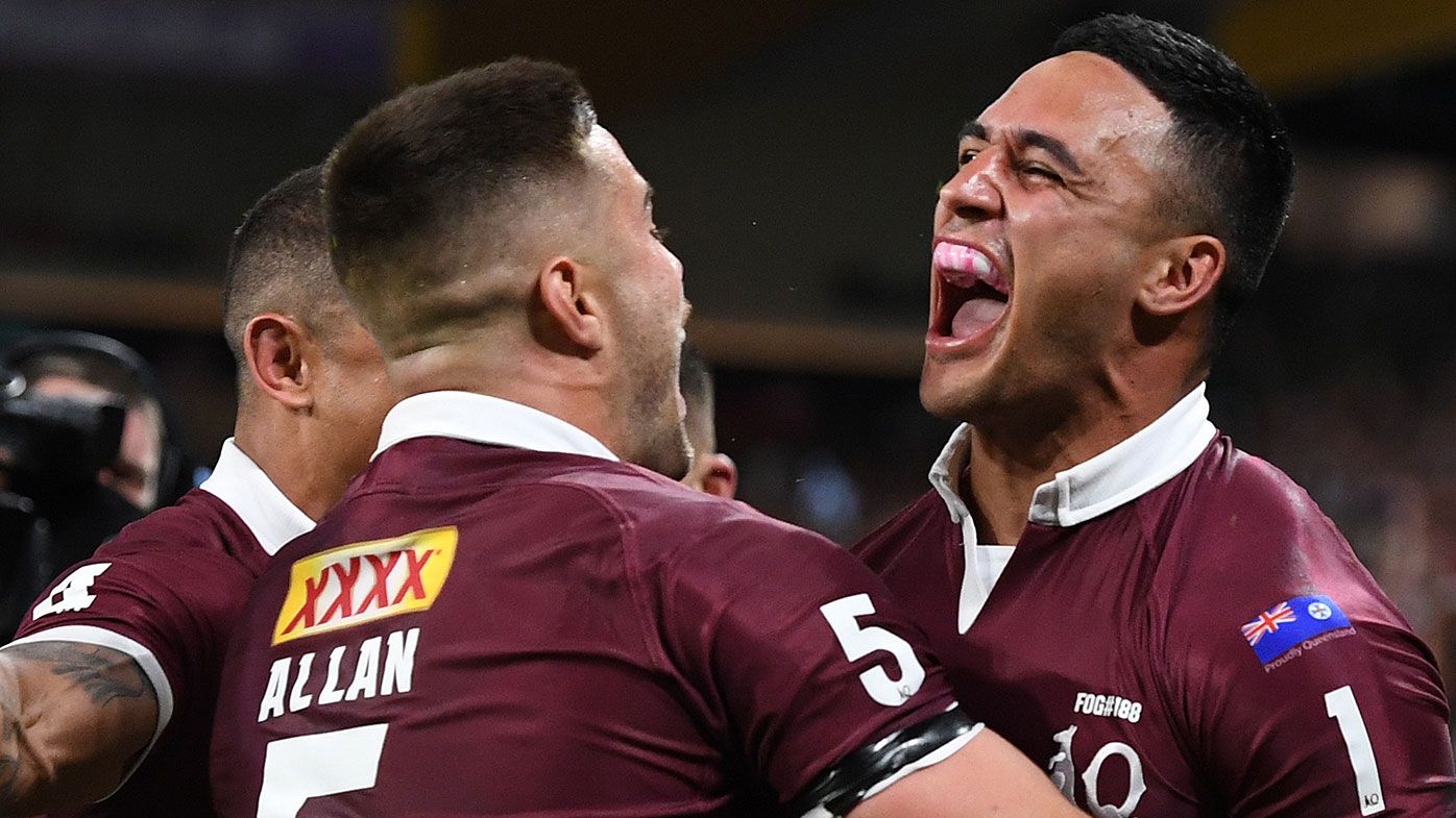 Valentine Holmes of the Maroons celebrates after scoring a try during game three of the State of Origin series between the Queensland Maroons
